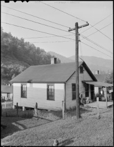 Home of Carl Ruth, miner, who lives in company housing project. Rental is $10 per month. Black Mountain Corporation... - NARA - 541278