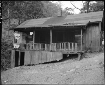 Home of George Hoskins, his wife and ten children. This is a three room house renting for $6.75 monthly, the family... - NARA - 541130
