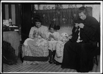 Home of Mrs. Schiaffo. She is a contractor, getting lace from the home workers in the neighborhood. Woman in black... - NARA - 523506