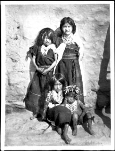 Hopi children from a well-to-do family waiting for the Snake Dance at the pueblo of Walpi, Arizona, ca.1898 (CHS-4635)