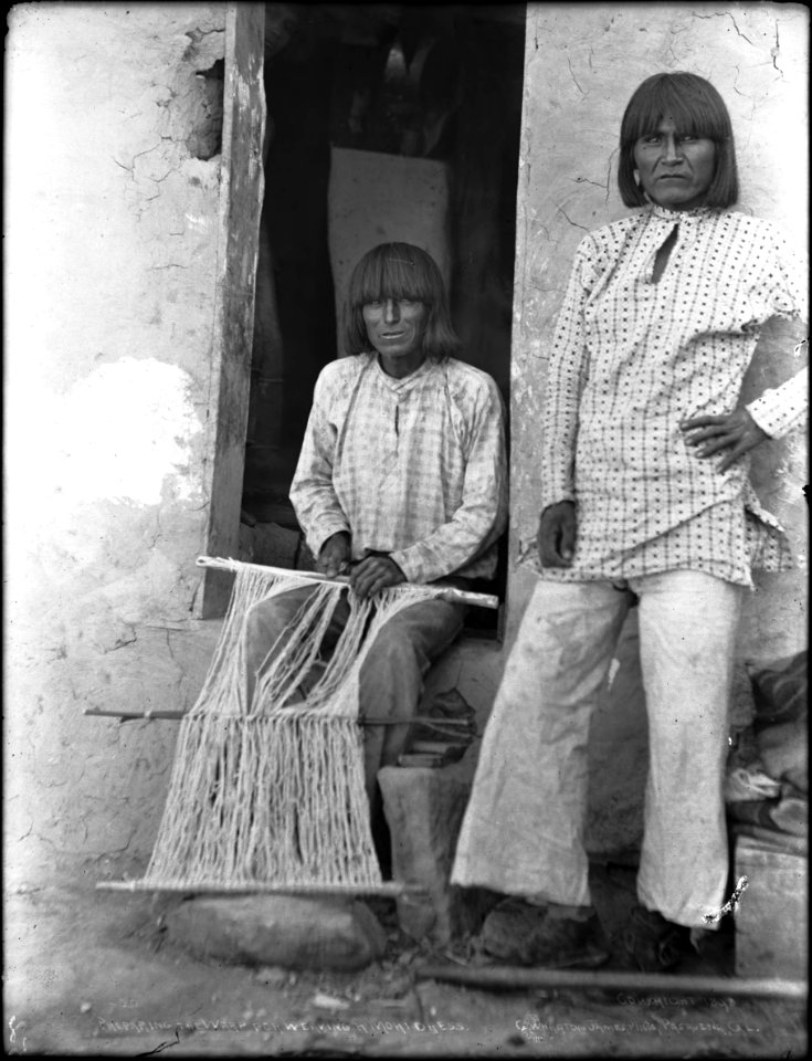 Hopi men preparing warp for weaving a dress, Arizona, ca.1898 (CHS-4573)