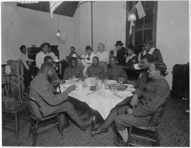 Honoring men about to leave for camps. (African American) women caring for their own. Newark, New . . . - NARA - 533585