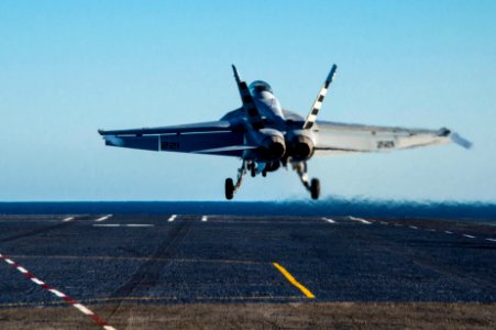 Hornet launches off Nimitz flight deck 141104-N-IP743-115