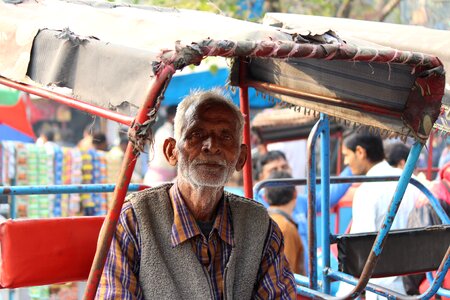 Rickshaw puller poor migrant photo