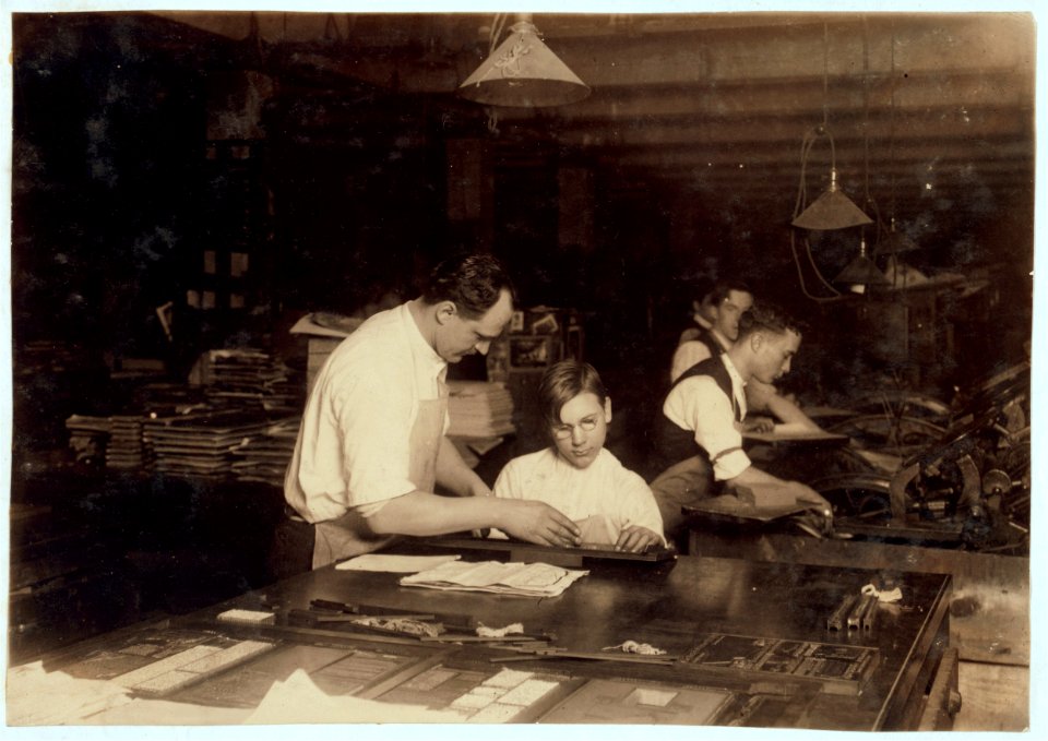 Horace Lindfors, 14 year old printers helper, sizing up leads for Riverside Press, First Av., N.Y. City. L.W. Hine, Feb. 1917. LOC nclc.05626