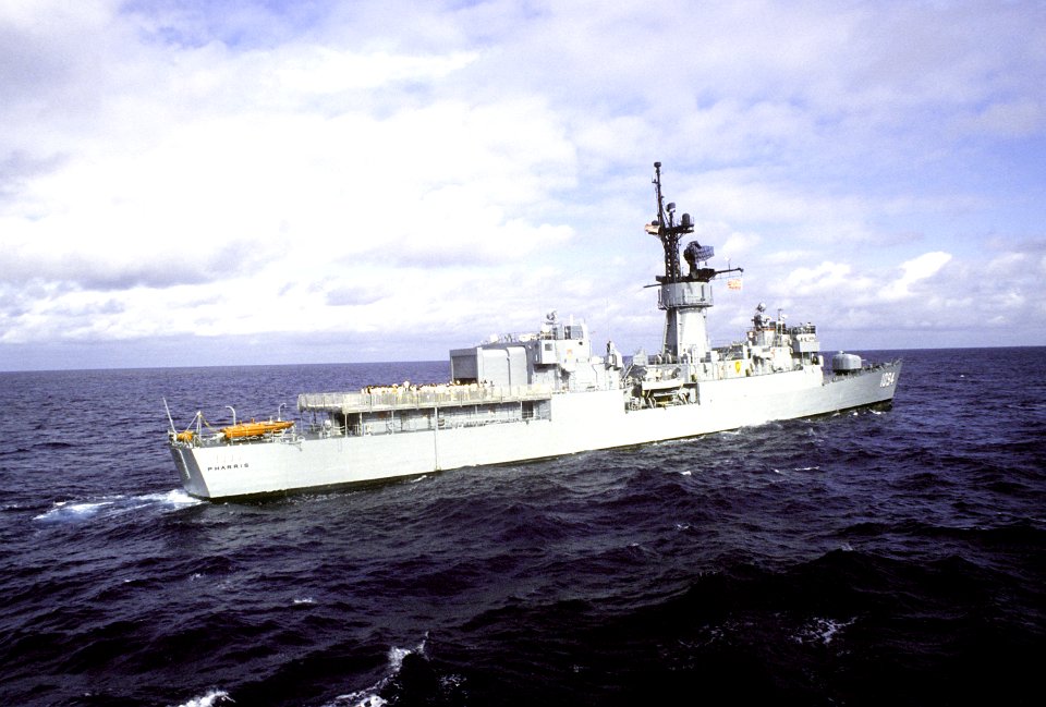 Horizontal starboard quarter view of USS Pharris (FF-1094) underway during Unitas XXI 1980 DN-ST-83-00133