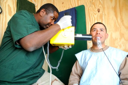 Hospital Corpsman conducts a dental x-ray DVIDS358566