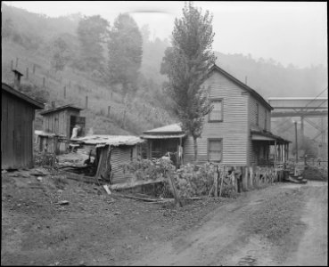 House and privies. Raven Red Ash Coal Company, No. 2 Mine, Raven, Tazewell County, Virginia. - NARA - 541069
