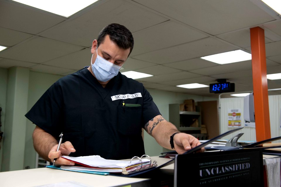 Hospital Corpsman 3rd Class Ryan Albin charts patient information (49811182182)