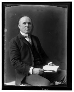 Howard Pyle, three-quarter length portrait, seated, facing slightly right LCCN2001695620