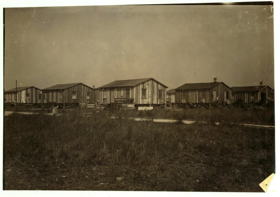 Housing conditions in the settlement of workers in Alabama Canning Co. Two families to a house, but they are separated. Housing conditions fairly good. LOC nclc.00840