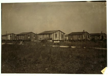 Housing conditions in the settlement of workers in Alabama Canning Co. Two families to a house, but they are separated. Housing conditions fairly good. LOC nclc.00840