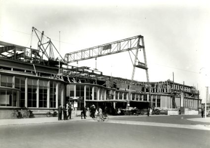 HUA-163721-Gezicht op het N.S.-station Utrecht C.S. te Utrecht, tijdens herstel van de schade na de brand van 17 december 1938. N.B. De afbeelding maakt deel uit van een serie foto's met betrekking tot de Spoorw