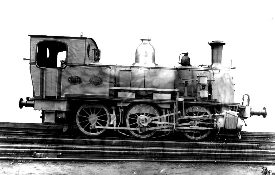 HUA-164491-Afbeelding van de stoomlocomotief nr. 1011 (serie 1000, nrs. 1005-1048) van de H.S.M. (later vernummerd tot nr. 7707 (serie 7700) van de N.S.)