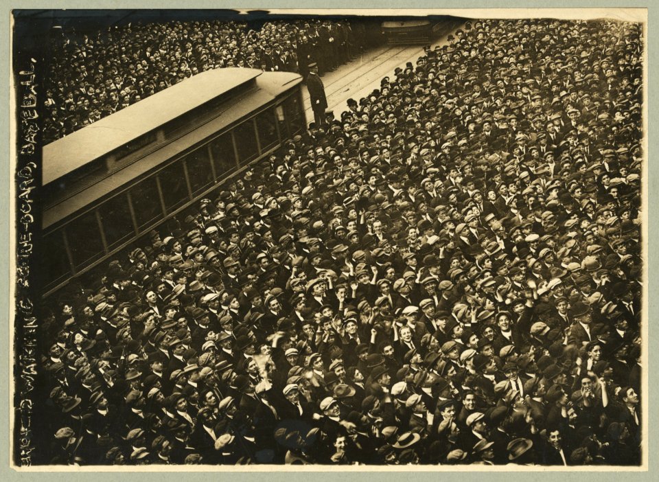 Huge crowd of baseball fans watching baseball scoreboard during World Series game in New York City LCCN92513260