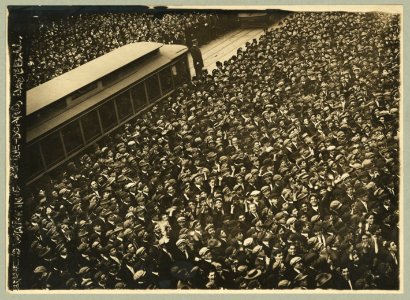 Huge crowd of baseball fans watching baseball scoreboard during World Series game in New York City LCCN92513260