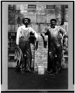 Hughes and Hammond, steeplejacks, posed full-length, standing, holding ropes LCCN93502961