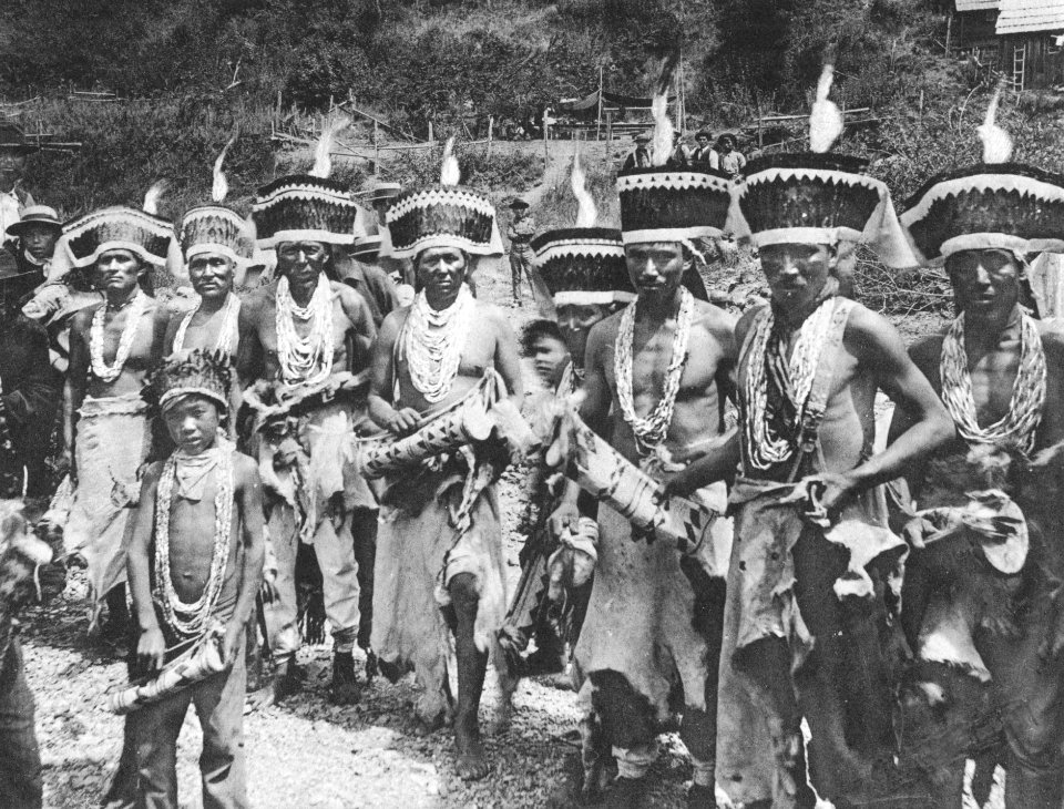 Hupa men at jumping dance with Yurok