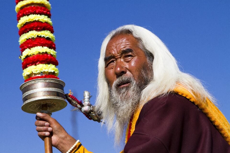 The old man looks expression