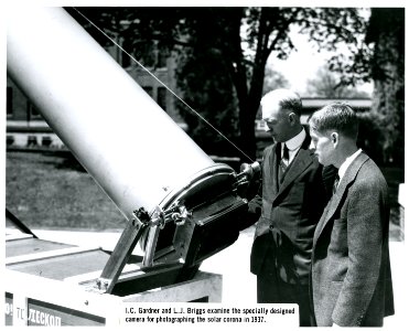 I. C. Gardner and L. J. Briggs examine the specially designed camera for photographing the solar corona in 1937