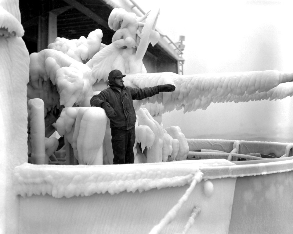 Ice covered guns on USS Oriskany (CVA-34) 1953
