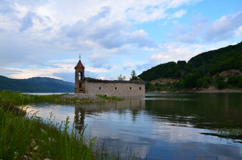 Travel mountain lake church in lake
