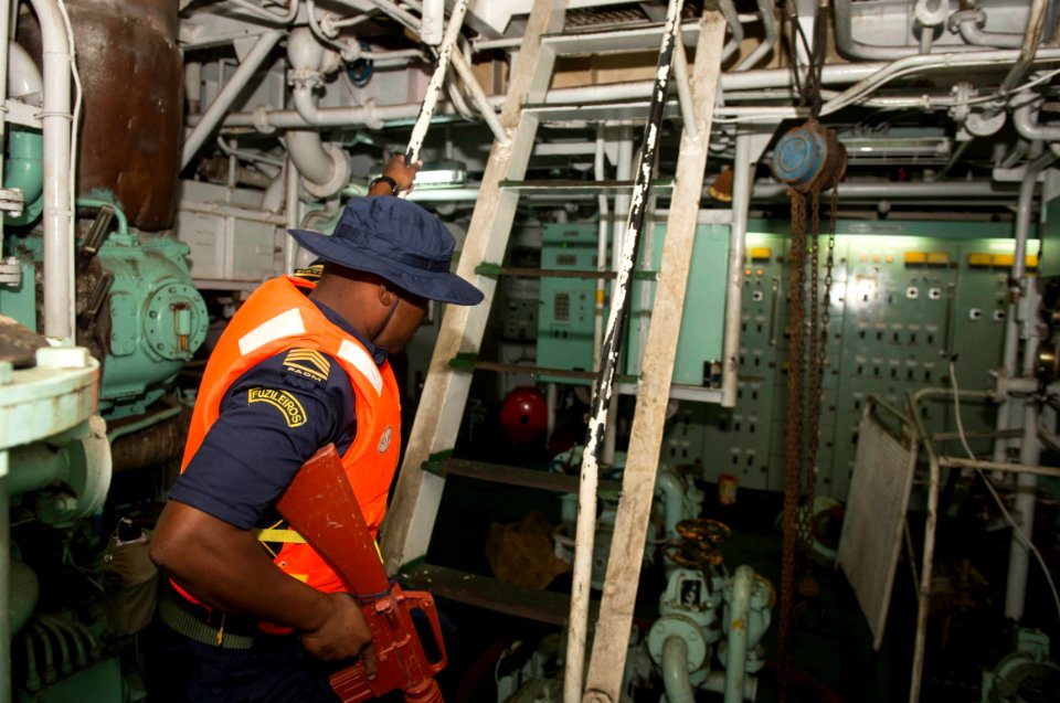 In a training exercise a Mozambique Marine boards a tugboat (32726725215)