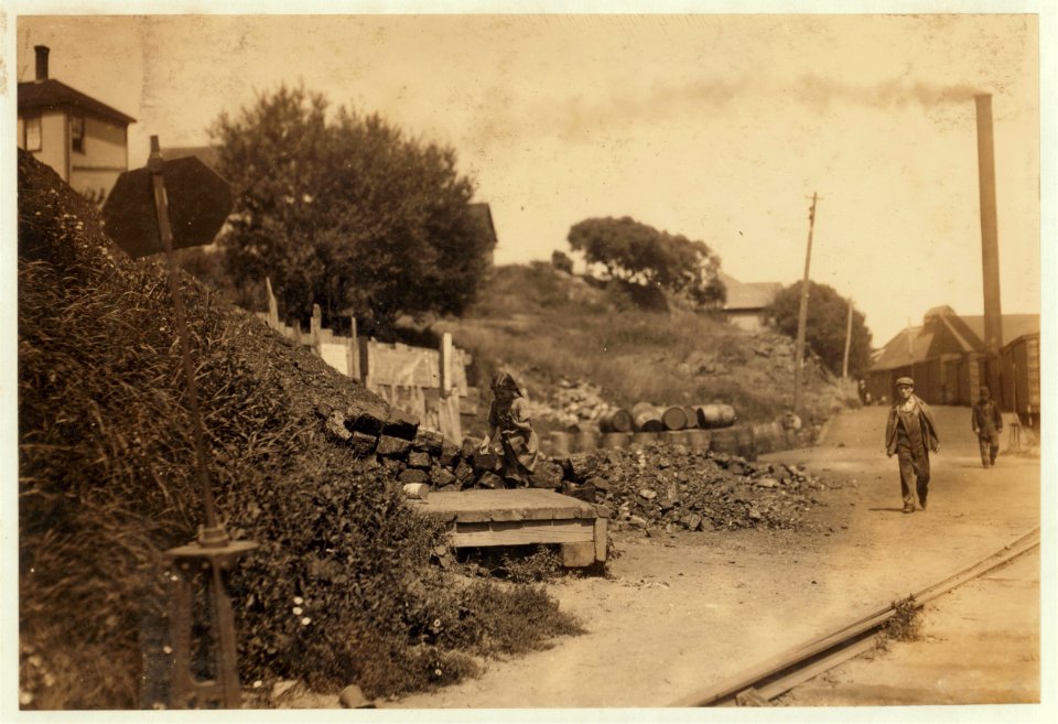 In center of the picture is Phoebe Thomas, 8 year old Syrian girl, running home from the factory all alone, her hand and arm bathed with blood, crying at the top of her voice. She had cut LOC nclc.00966