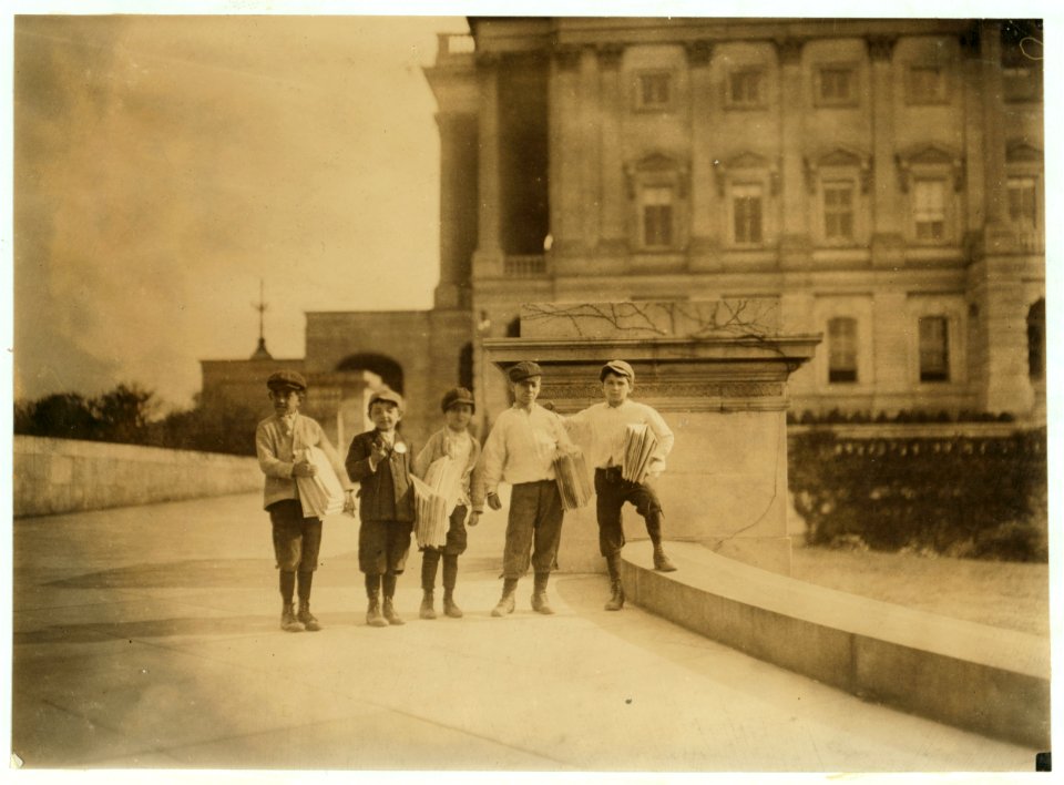 In comparison with governmental affairs newsies are small matters. This photo taken in the shadow of the National Capitol where the laws are made. This group of young newsboys sells on the LOC cph.3c22958