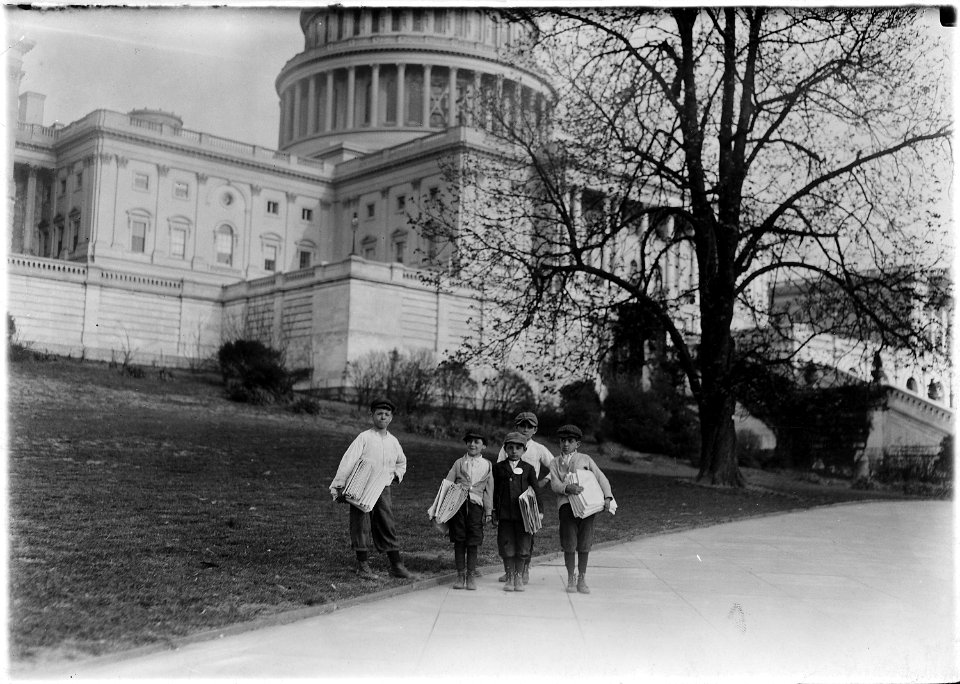 In comparison with governmental affairs, newsies are small matters. This photo was taken in the shadow where the laws... - NARA - 523534