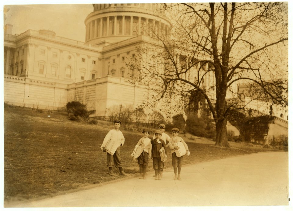 In comparison with governmental affairs newsies are small matters. This photo taken in the shadow of the National Capitol where the laws are made. This group of young newsboys sells on the LOC cph.3c22959