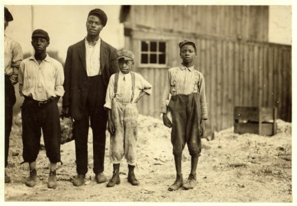 In the Alexandria glass factories, negroes work side by side with the white workers. Also in Richmond. These are some of those working in Alexandria (Va.) Glass Factory. LOC nclc.01299