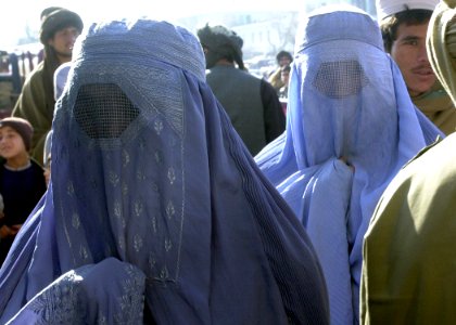 In the Mazar-e Sharif marketplace or any public area, women wear Burkas DF-SD-03-04094