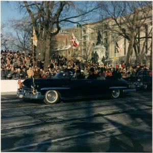Inaugural Parade. President and First Lady in Limousine, spectators. Washington, D.C., Pennsylvania Ave. - NARA - 194223