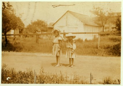 Inez Johnson (nine years old) and Lily, her cousin (seven years old). Both were helping Mrs. Johnson, a spooler in Tupelo (Miss.) Cotton Mills. Inez says she works regularly. LOC nclc.02136