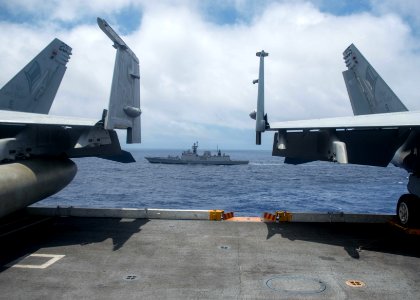 Indian Navy Shivalik-class stealth multi-role frigate INS Sahyadri (F49) steams alongside USS John C. Stennis (CVN 74) during Malabar 2016