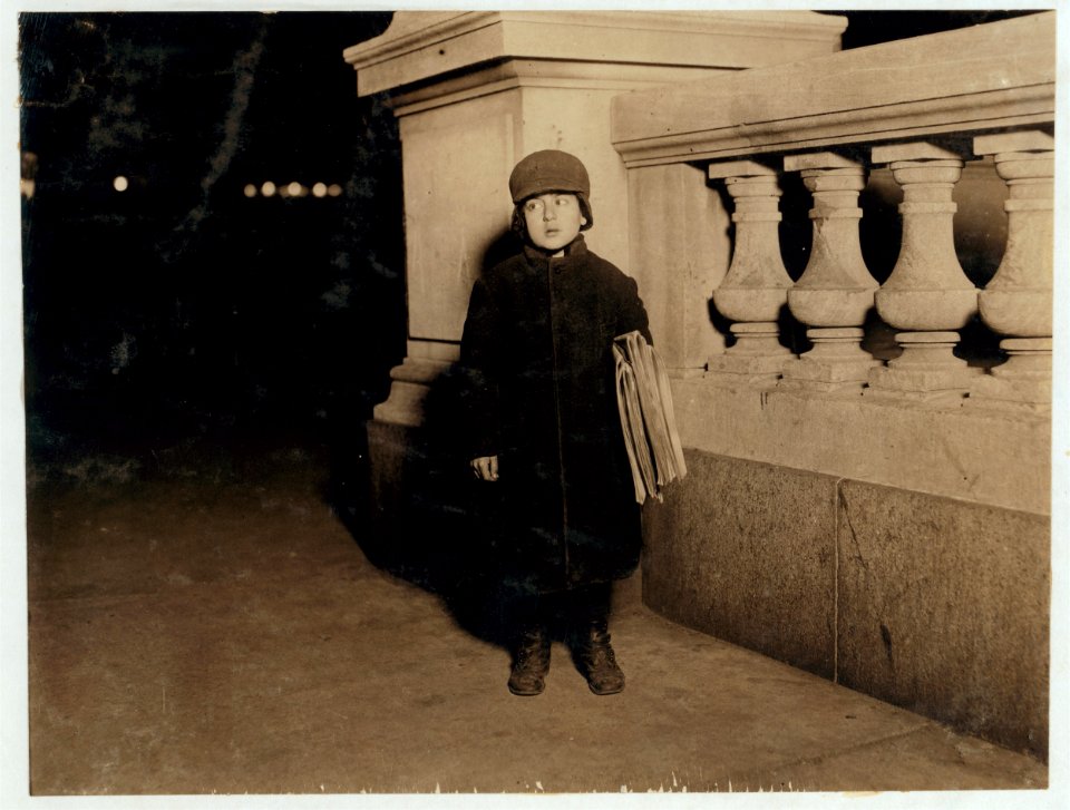 Izzie Kline, 8 yrs. old, Newsboy. Sells until 7 P.M. some nights. Taken at 6 P.M. LOC nclc.03835