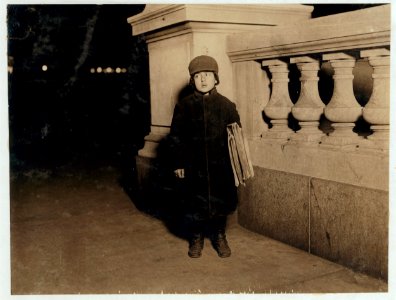 Izzie Kline, 8 yrs. old, Newsboy. Sells until 7 P.M. some nights. Taken at 6 P.M. LOC nclc.03835
