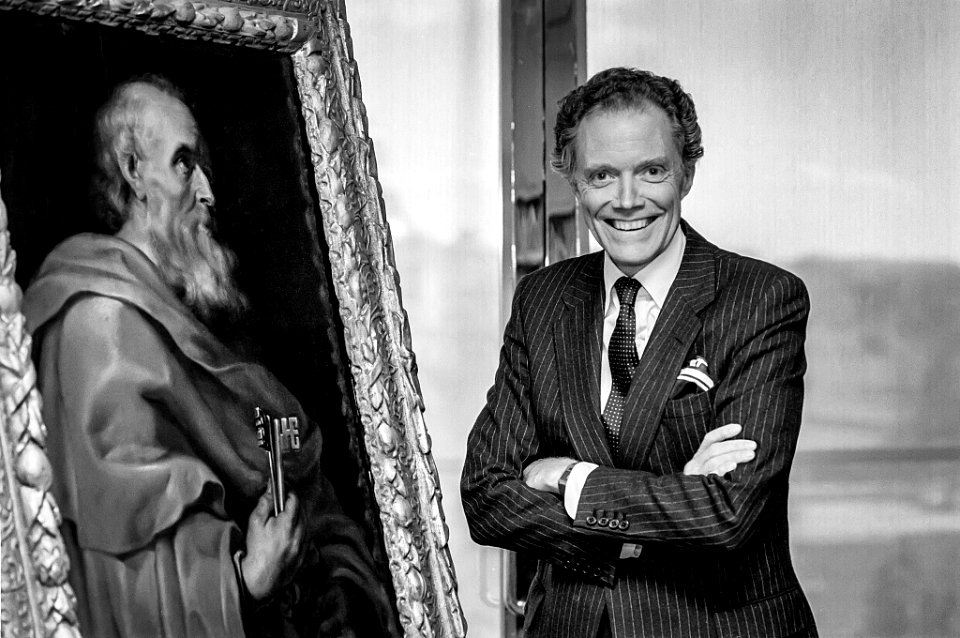 J. Carter Brown, Director of the National Gallery of Art with Peter Paul Rubens painting Saint Peter