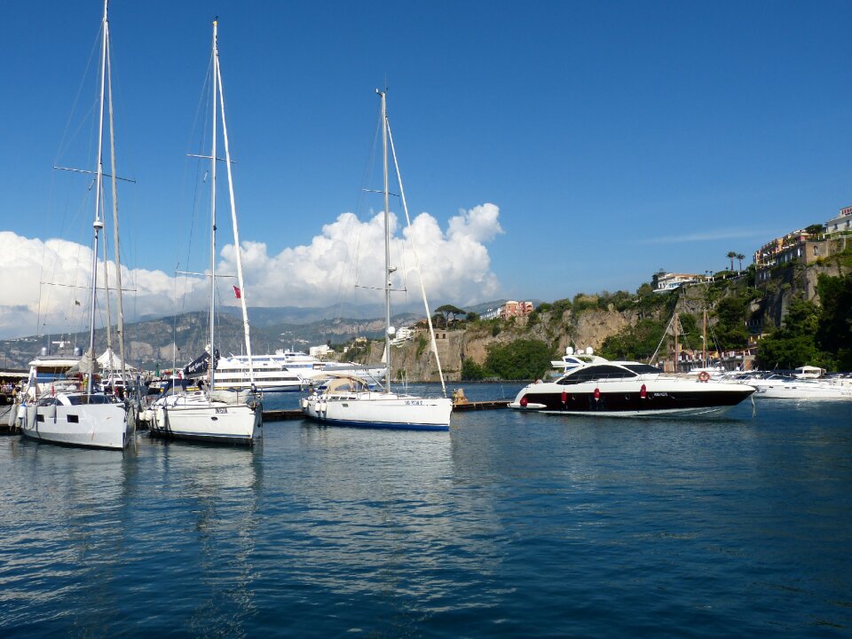 Cityscape coast boats photo