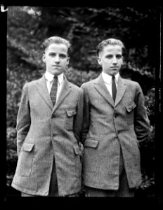 J. Walter Lang (left) and Francis Lang, 17 yr. old twins of Manchester, Ohio, who narrowly escaped death on the steamer Island Queen on its trip from Cincinnati to Point Pleasant, Ohio on LCCN2016891512
