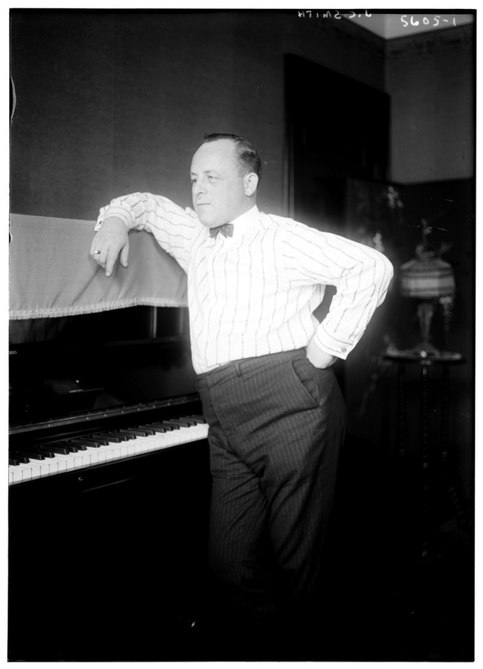 J.C. Smith (standing near piano) LCCN2014713601