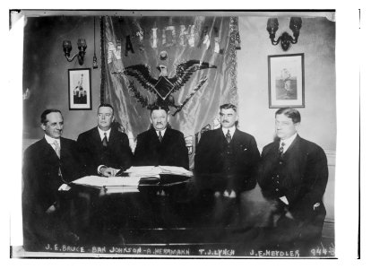 J.E. Bruce, Ban Johnson, A. Herrmann, T.J. Lynch, J.E. Meydler at table together LCCN2014684442