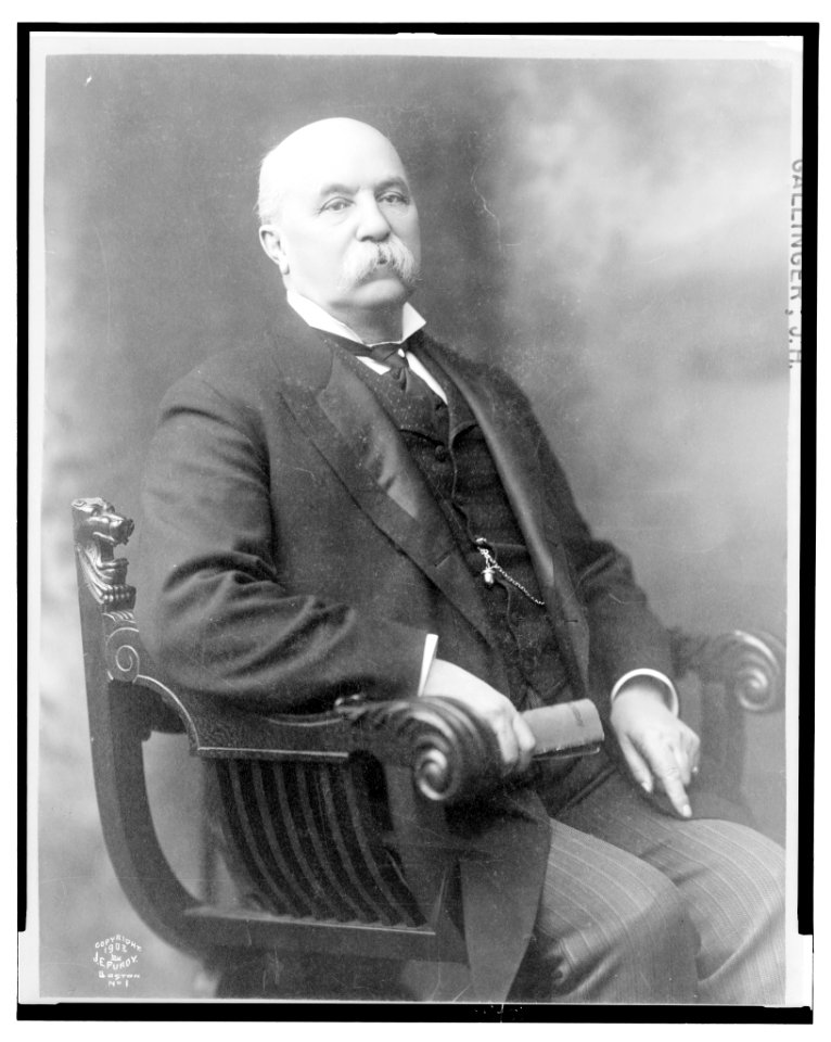 J.H. Gallinger, three-quarter length studio portrait, seated, facing slightly right LCCN2004676649