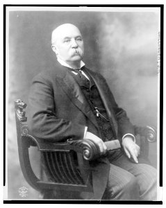 J.H. Gallinger, three-quarter length studio portrait, seated, facing slightly right LCCN2004676649