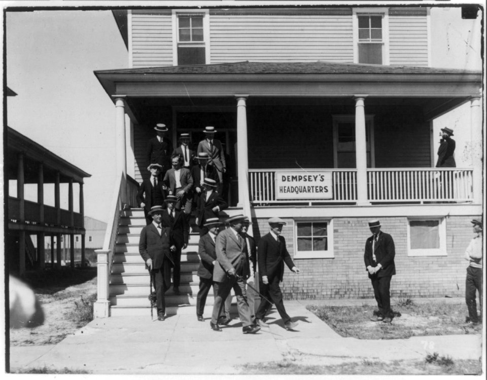Jack Dempsey at his training camp, June 1921- group of men leaving camp headquarters LCCN2005681073