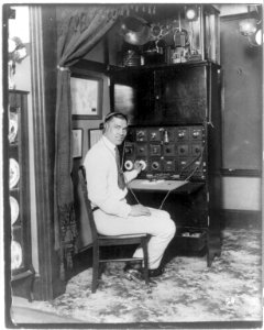 Jack Dempsey operating 2-way wireless radio LCCN2016651833