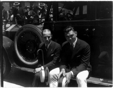 Jack Dempsey at his training camp, June 1921- seated with man on auto running board LCCN2005681064