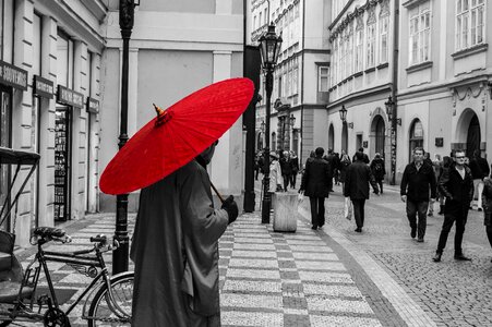 Red umbrella black and white photo