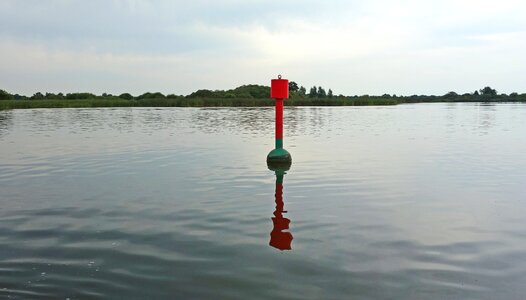 Watermarkering waters setting of buoys photo